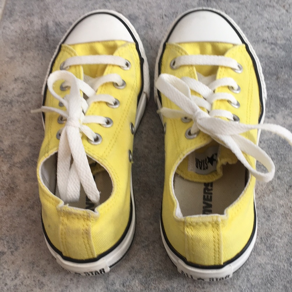 Girls size 13 yellow Converse sneakers.